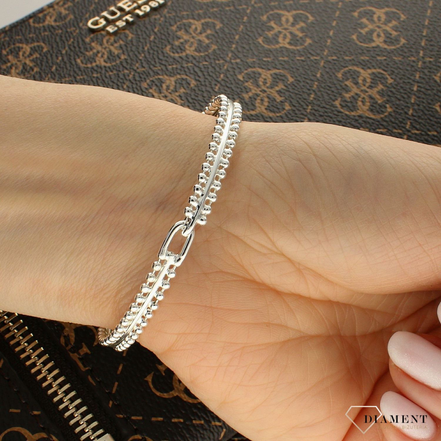 Bransoletka sztywna KARPIŃSKI w kolorze srebra B14141AG (2).jpg