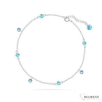 Srebrna bransoletka na nogę z błękitnymi kryształkami Swarovskiego to oryginalna, kobieca biżuteria, szczególnie pasująca do letnich i wakacyjnych stylizacji..jpg