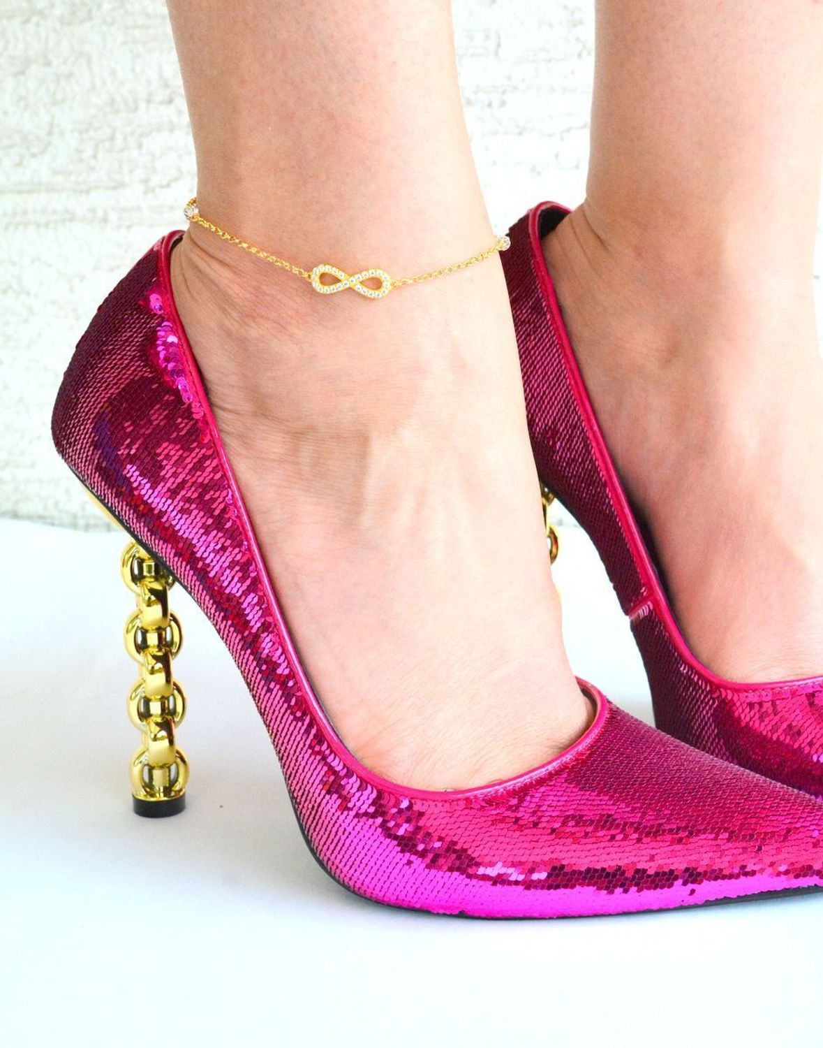 Pozłacana bransoletka na nogę z kryształkami Swarovskiego i znakiem nieskończoności BAG31024. Bransoletki na nogę to oryginalna, kobieca biżuteria, szczególnie pasująca do letnich i wakacyjnych stylizacji..jpg