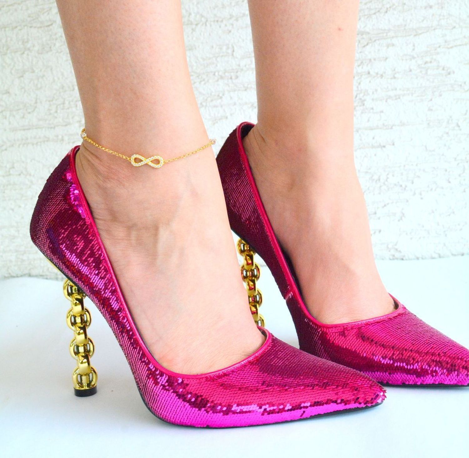 Pozłacana bransoletka na nogę z kryształkami Swarovskiego i znakiem nieskończoności BAG31024. Bransoletki na nogę to oryginalna, kobieca biżuteria, szczególnie pasująca do letnich i wakacyjnych stylizacji..jpg