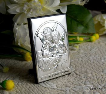 Obrazek srebrny przedstawiający Aniołki to idealny upominek z okazji Chrztu Świętego, który powinien zagościć w każdym dziecięcym pokoju wnosząc radość.  Wykonany z wysokiej jakości drewna oraz.JPG