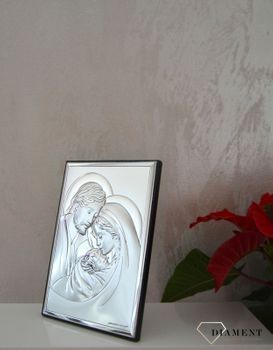 Piękny srebrny obrazek w kształcie prostokąta ukazujący Świętą Rodzinę to niezwykle piękny drobiazg, który sprawi, że jego właściciel zaprosi do swojego domu radość.JPG