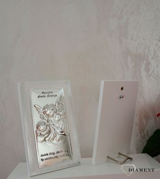 Obrazek przedstawiający wizerunek Anioła Stróża z dzieciątkiem, wykonany techniką laminatu z aluminium i srebra. To znakomita ozdoba każdego dziecięcego pokoju. Pam (3).JPG