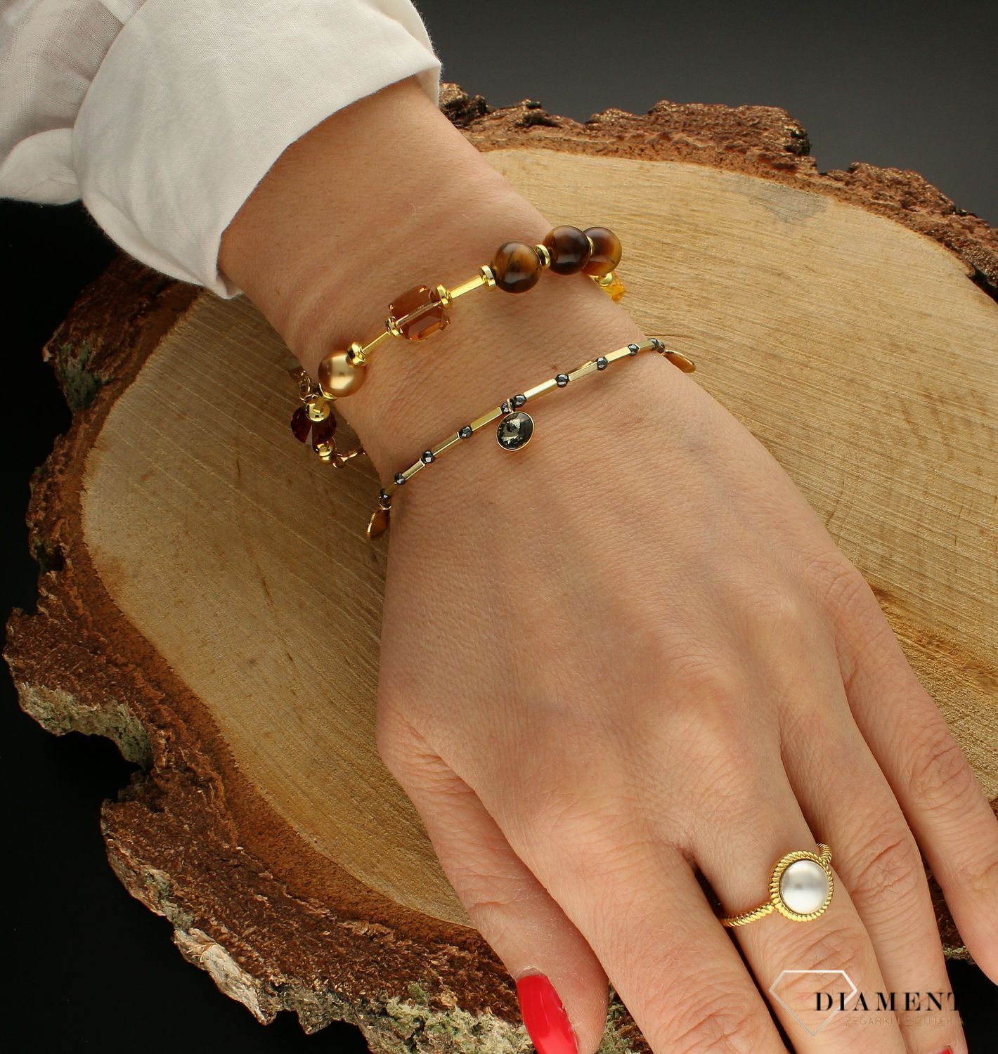 Srebrna bransoletka damska Swarovski z kryształkami, perłą i kamieniami naturalnymi BG56018TOLCT. Bransoletka z kryształkami Swarovskiego. Bransoletka z perłami. Bransoletka z kamieniami tygrysie oko, hematyt. Bran.jpg