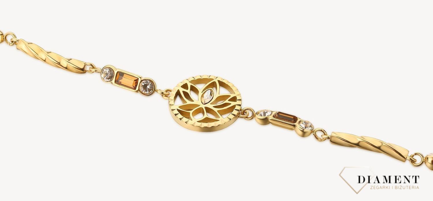 Bransoletka damska stalowa BROSWAY '' Chakra Mistyczna'' BHKB113 💎 Bransoletka wykonana ze stali w kolorze złotym 💎 Bransoletka z kwiatem lotosu, kryształami w złotym cieniu, jasnym złotym kwarcem i przydymionym topazem .jpg