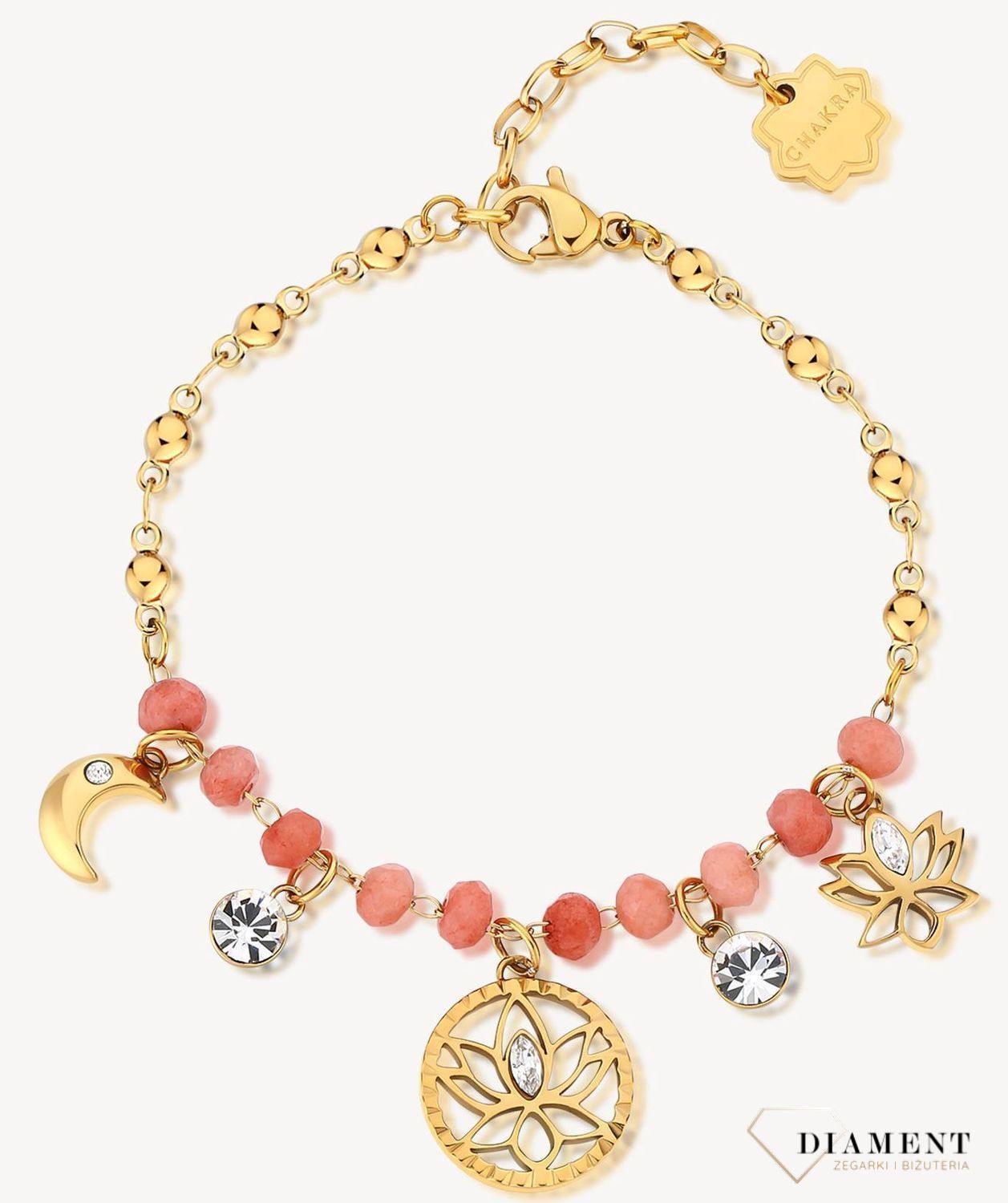 Bransoletka damska stalowa BROSWAY '' Chakra Mistyczna'' BHKB137 💎 Bransoletka wykonana ze stali w kolorze złotym 💎 Bransoletka z chalcedonem w kolorze koralowym, wisiorkami w kształcie kwiatu lotosu, księżycem i kryszta.jpg