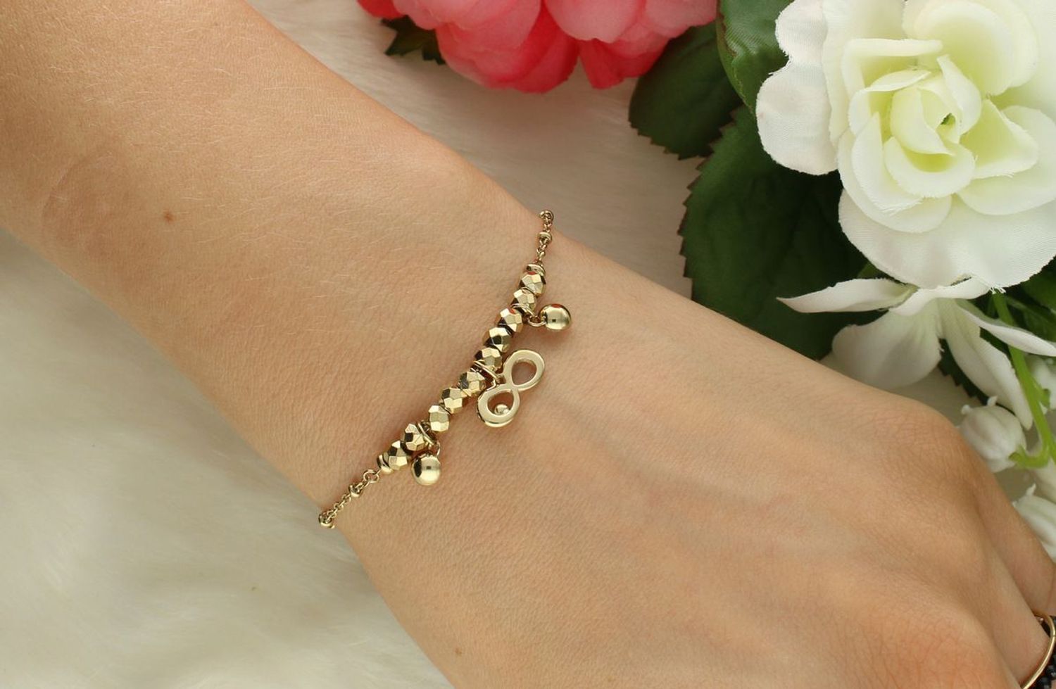 Bransoletka Brosway Chakra BHKB262 – stal 316L, złoty PVD, biały koralik, zawieszka nieskończoności. Stylowy dodatek z eleganckim przesłaniem.1.jpg