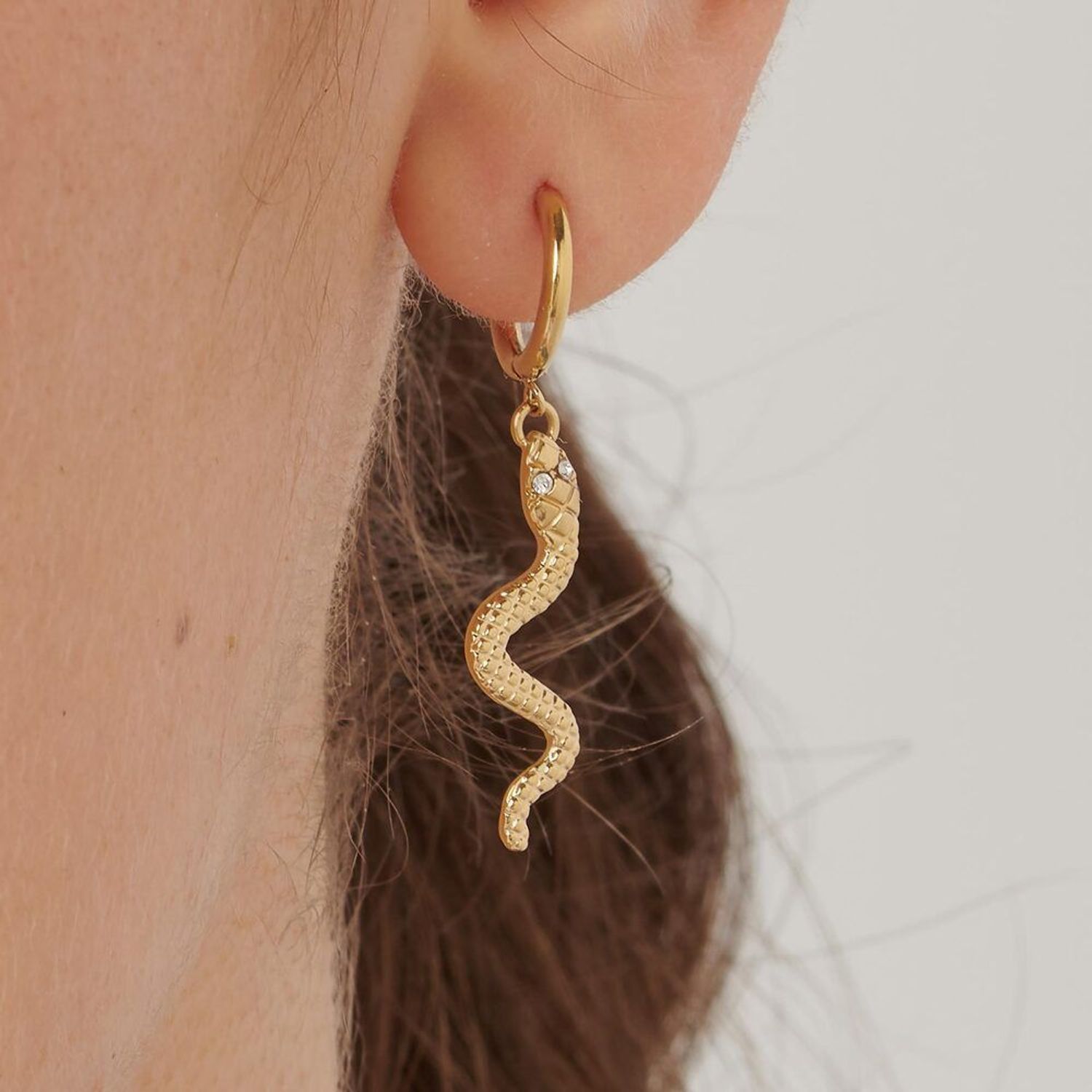 Kolczyki stalowe koła pozłacane wiszące węże Brosway Chakra BHKE193..jpg