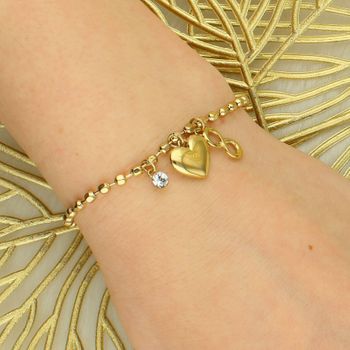 Bransoletka damska Brosway Chakra BHKLE06 – stal pozłacana z sercem i znakiem nieskończoności serce.jpg