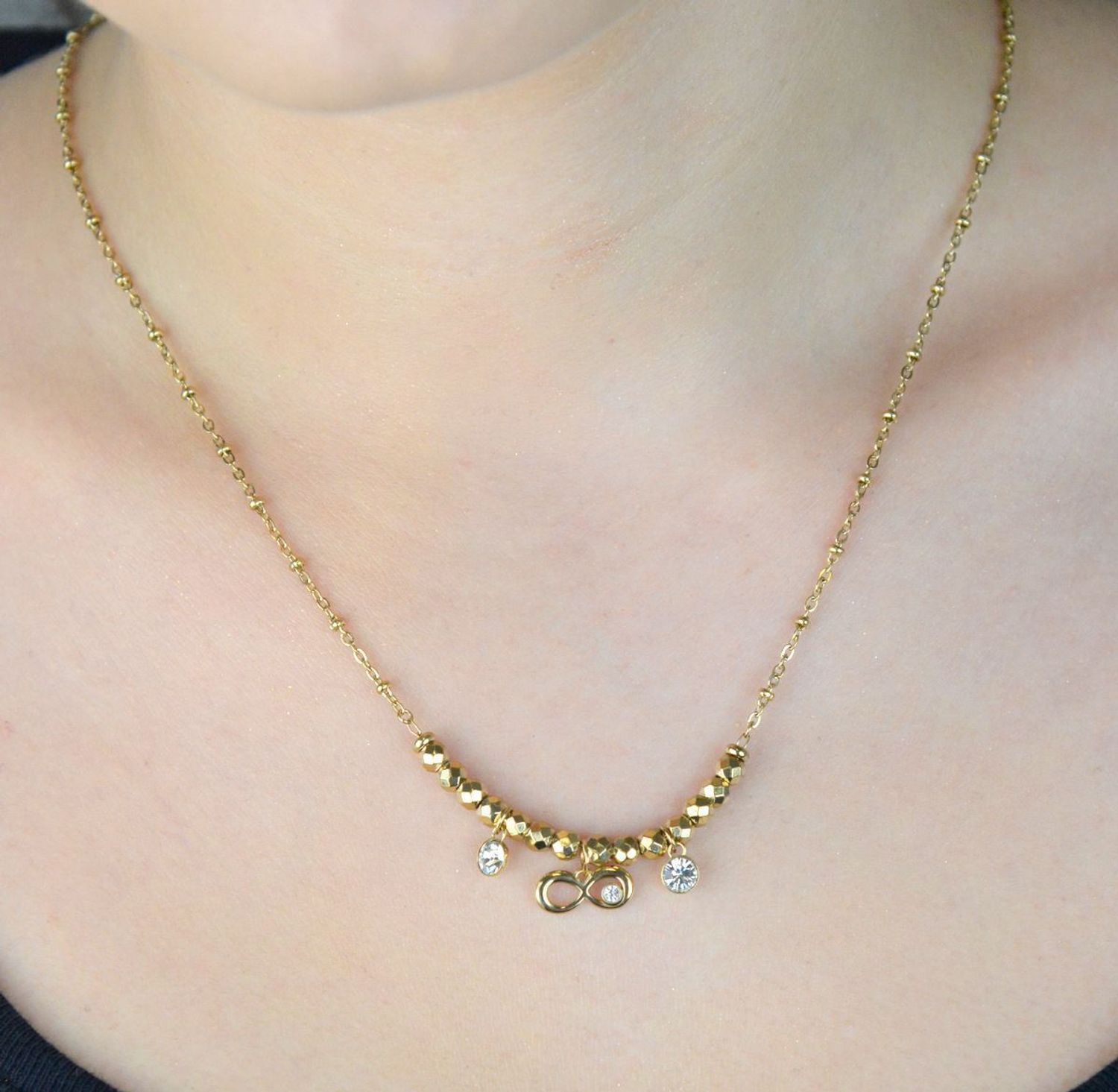 Naszyjnik Brosway złocony z symbolem nieskończoności i białymi kryształami  Biżuteria stalowa 316L (1).jpg