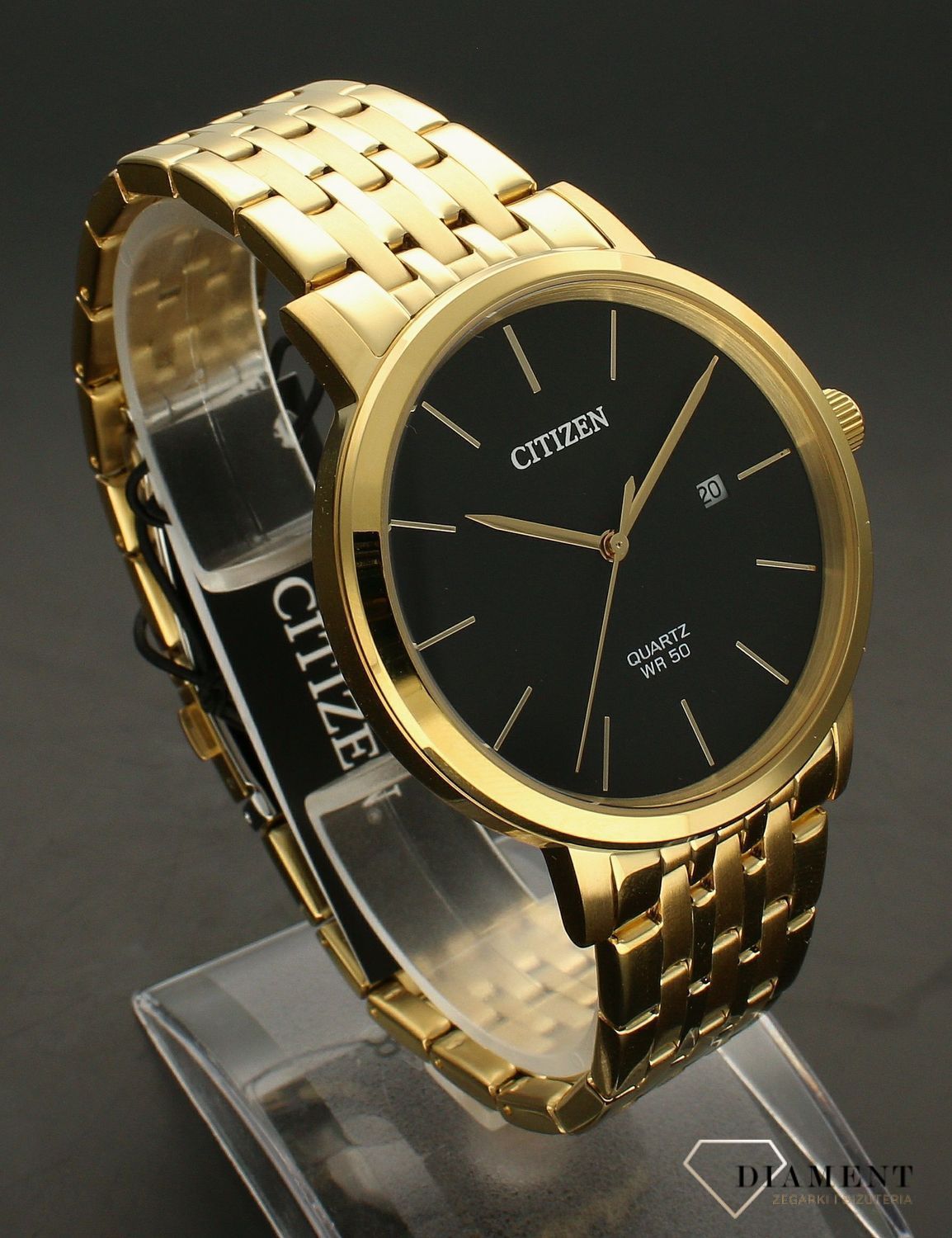 Zegarek męski Citizen BI5072-51E koloru złotego wyposażony jest w kwarcowy mechanizm, zasilany za pomocą baterii. Posiada bardzo wysoką dokładność mierzenia czasu +- 10 sekund w przeciągu 30 dni..webp