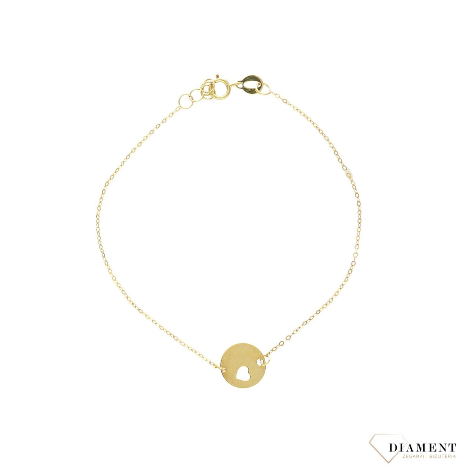 Złota bransoletka z motywem kółka na którym zostało wycięte serduszko to piękny upominek dla ukochanej kobiety. Złota biżuteria. Bransoletka z serduszkiem.  (1).jpg