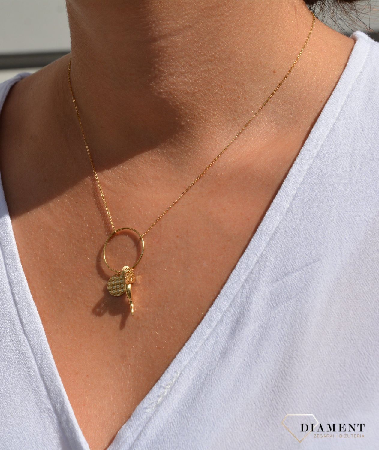 Złoty naszyjnik celebrytka 585 'koła z zawieszkami'.jpg