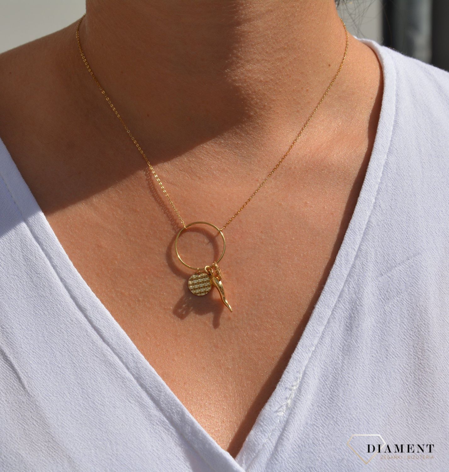 Złoty naszyjnik celebrytka 585 'koła z zawieszkami'.jpg