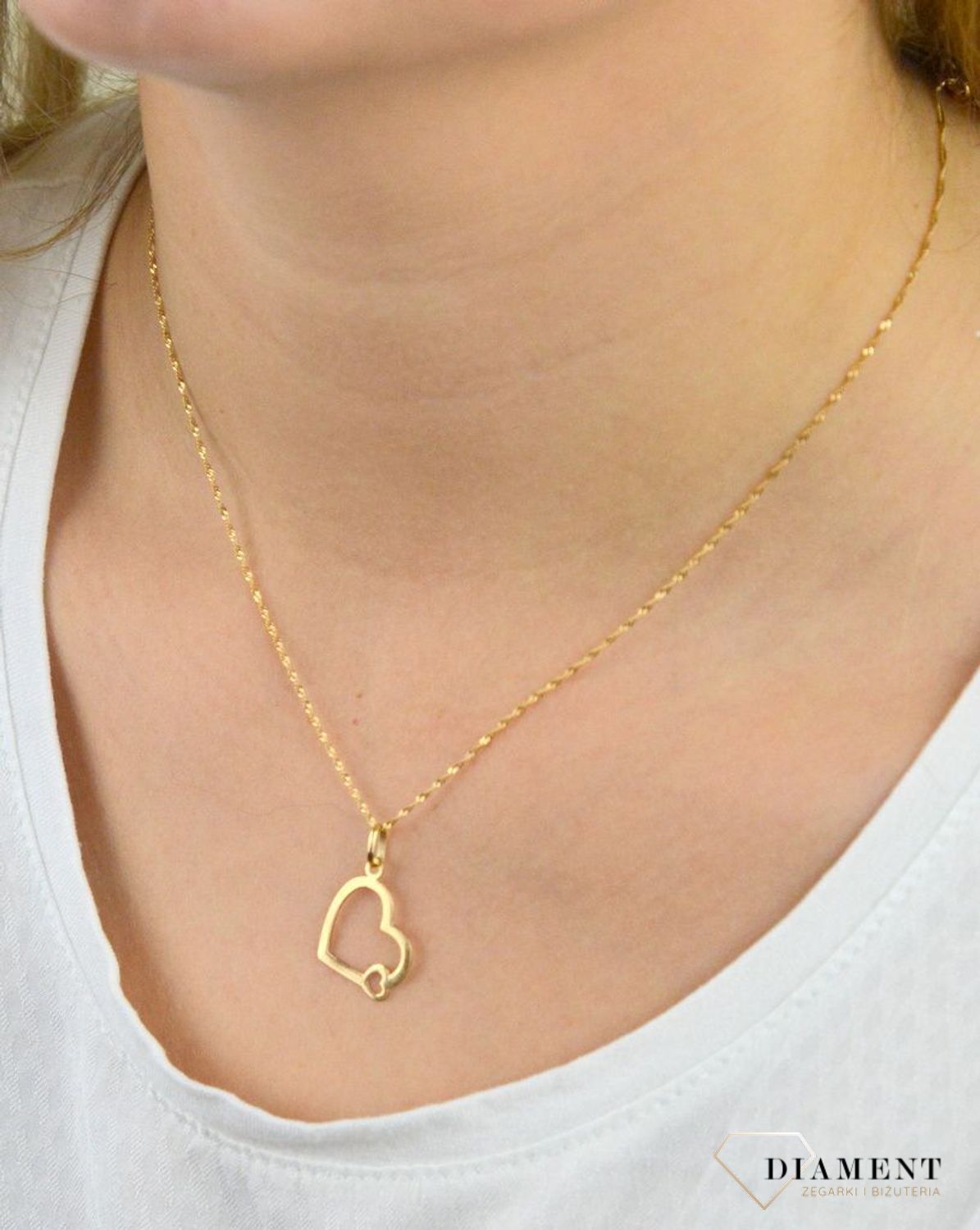Złota zawieszka kontur dwóch serc BKZ000000-431.jpg