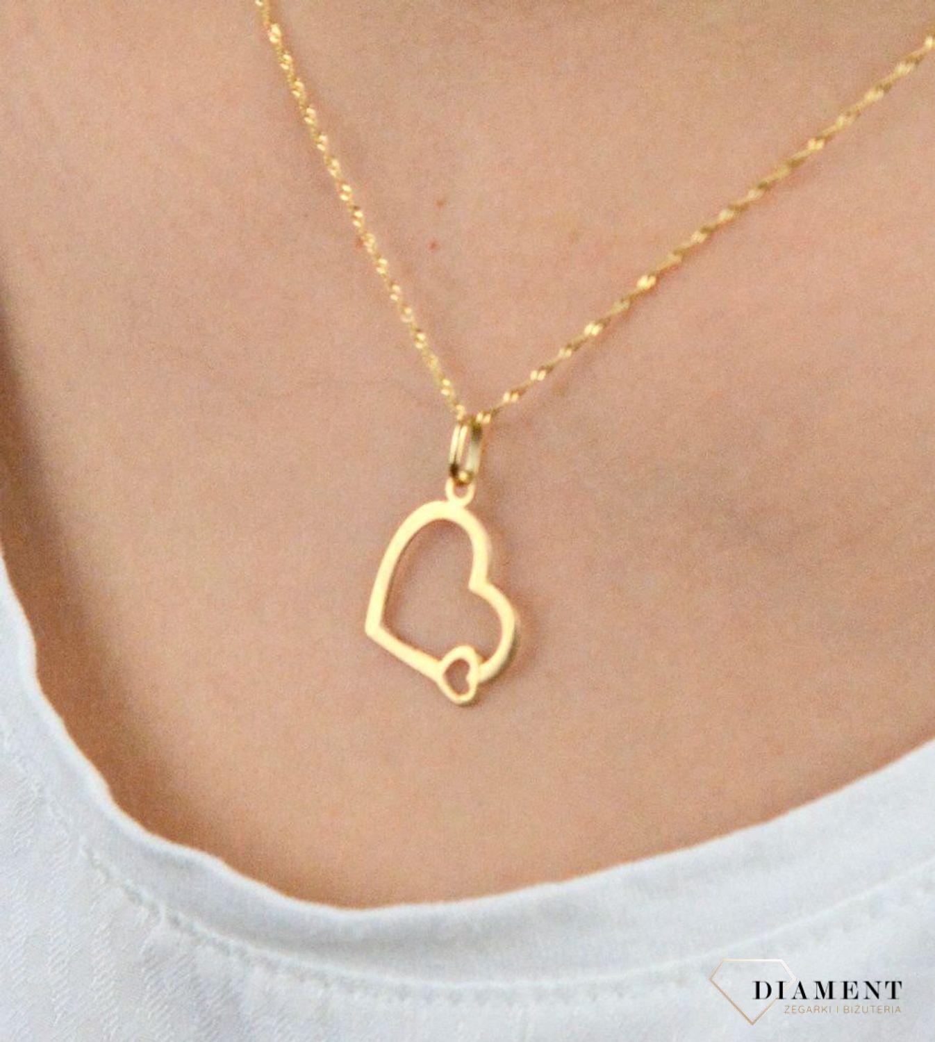 Złota zawieszka kontur dwóch serc BKZ000000-431.jpg