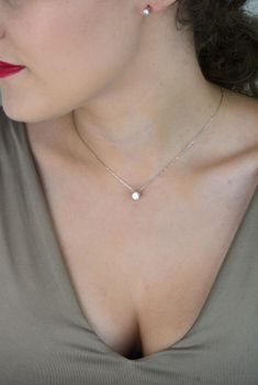 Naszyjnik ze srebra 925 z białym moissanitem 6 mm w czterech łapkach. Elegancki, certyfikowany dodatek na każdą okazję. Model CQ BMCP066-6 (8).JPG