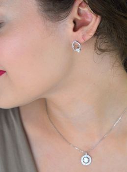 Kolczyki srebrne z moissanitem 0,60 ct (5,5 mm), certyfikat GRA, powłoka z rodu i palladu. Elegancki styl i jakość Brizzling Jewels. Idealny wybór na prezent (3).JPG