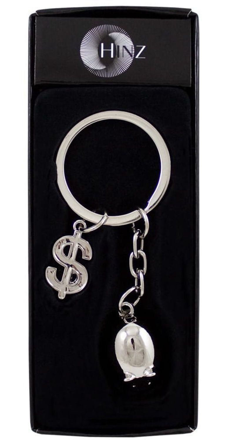 Metalowy brelok BR293 w kształcie świnki z przywieszką symbolu dolara. Długość 9 cm, zapakowany w czarne flokowane pudełko. Idealny prezent z przesłaniem szczęścia i pomyślności.1.jpg