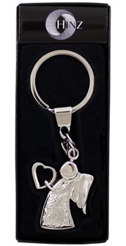 Piękny brelok BR313 w kształcie aniołka trzymającego serduszko, wykonany z metalu. Długość 11,5 cm. Pakowany w czarne flokowane pudełko. Idealny prezent pełen symboliki.1.jpg