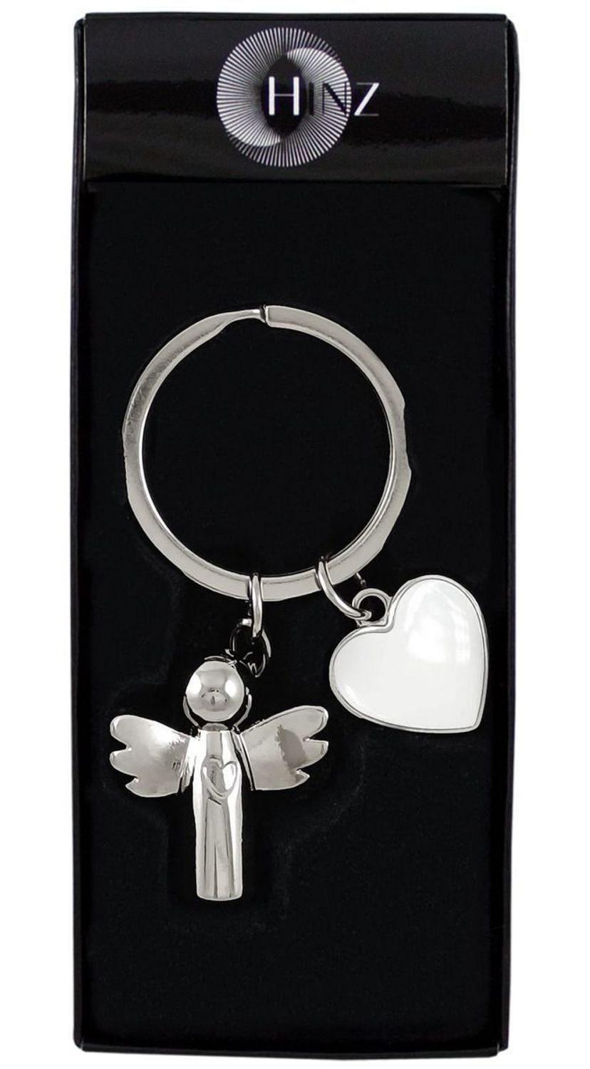 Brelok BR365 w kształcie aniołka z zawieszką serduszko, wykonany z metalu w kolorze chromu. Długość 7,5 cm, pakowany w czarne flokowane pudełko. Idealny 1.jpg