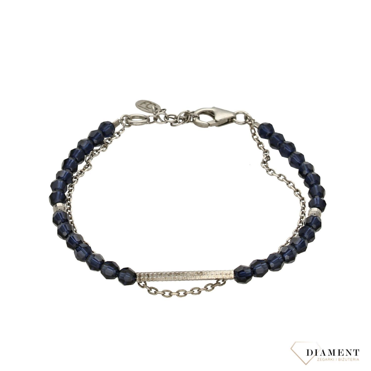 Bransoletka ozdobiona granatowymi kryształami Swarovskiego ze srebrnymi dodatkami. Idealny pomysł na prezent dla kobiety. Bransoletkę można łączyć z inną biżuterią (1).jpg