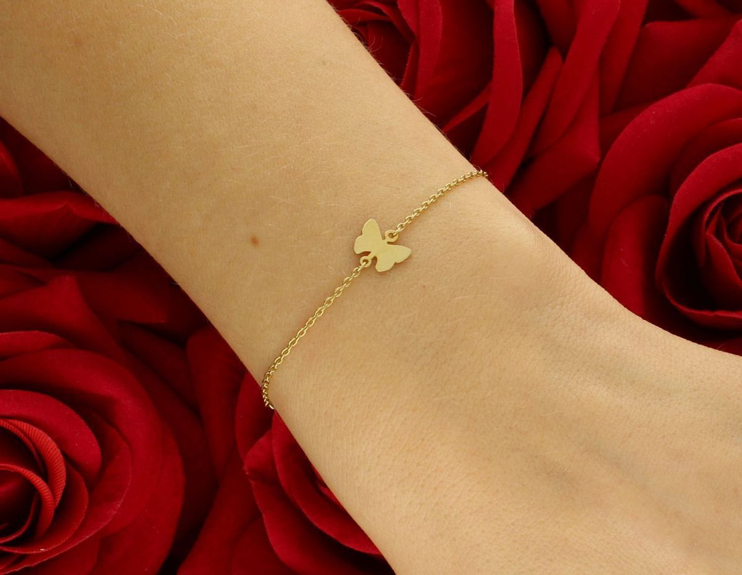 Bransoletka złota trzy elementy ozdobne pr 333, BRA-000000-707-333 Złota bransoletka wykonana z 8 karatowego żółtego złota. Złota biżuteria w oryginalnej formie ozdobiona motylkiem 1.jpg