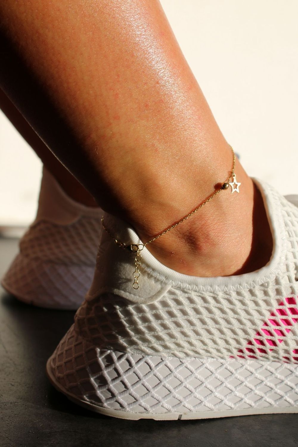 Złota bransoletka na nogę z gwiazdką i kuleczką 585.jpg