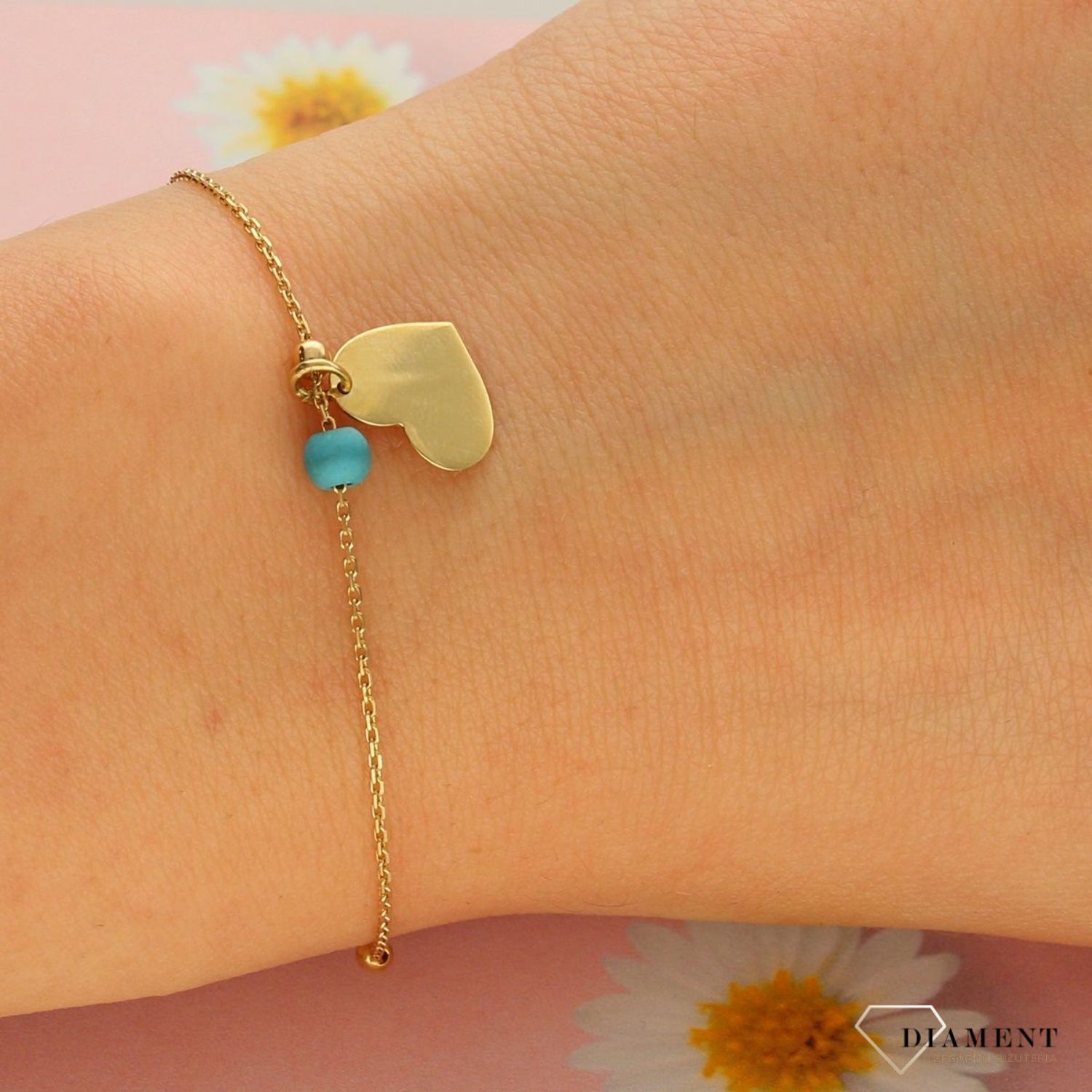 Złota bransoletka celebrytka 585 'serce z niebieskim koralikiem'  (1).jpg