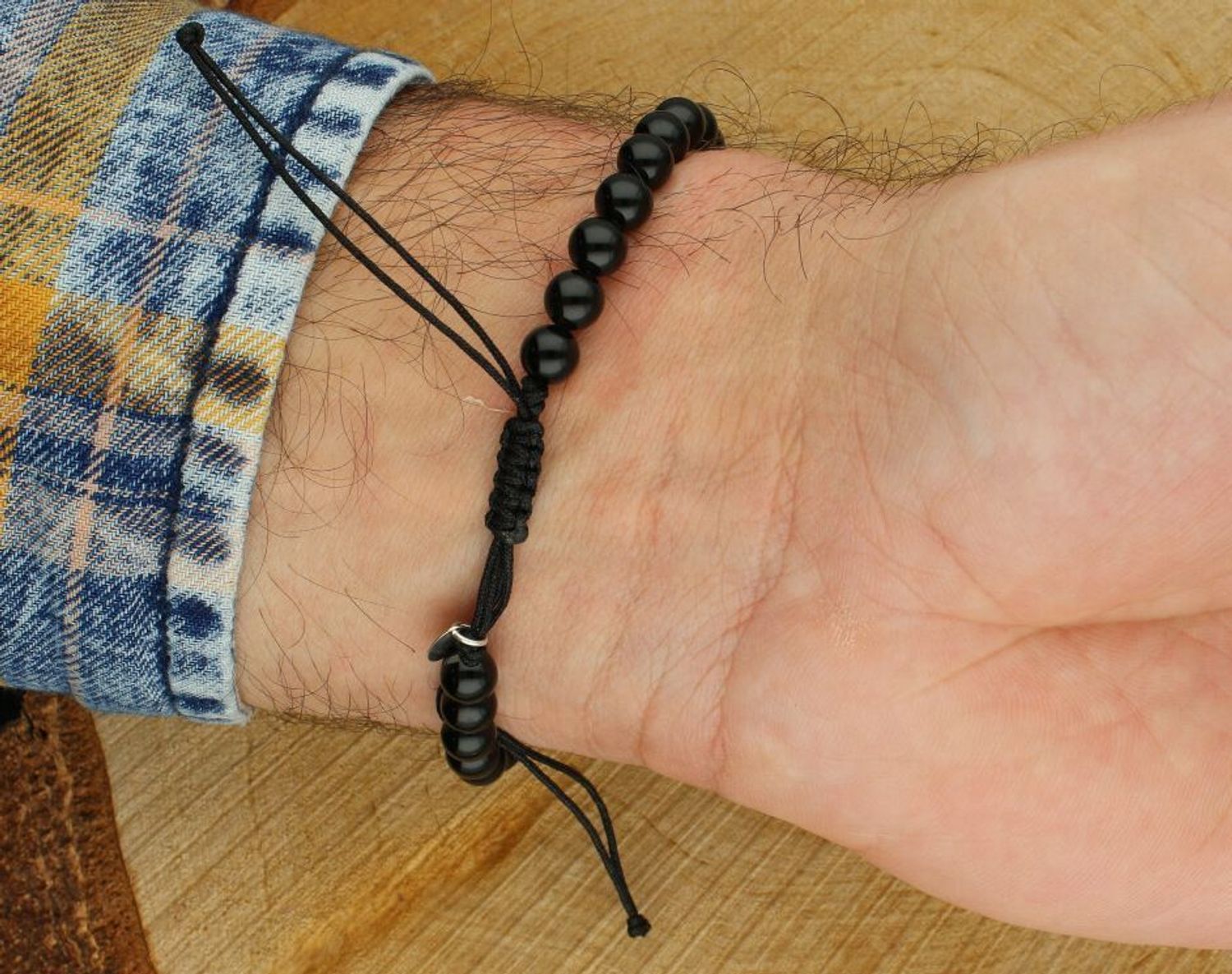 Srebrna bransoletka „Najlepszy Tata” ze srebra 925 na czarnym, regulowanym sznurku. Onyks – kamień siły i ochrony. Idealny prezent dla taty na każdą okazję.1.jpg