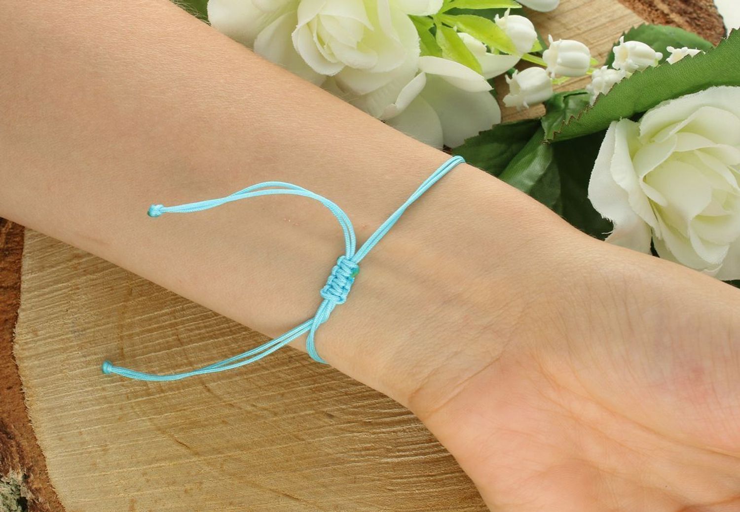 Bransoletka srebrna pozłacana 925 BS3245v53, na niebieskim sznureczku z gładką zawieszką serduszkiem (1,0 cm x 9 mm). Waga 0,75 g. Regulowane zapięcie. Subtelna i elegancka.1.jpg