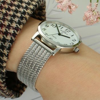 Bisset BSAE80SAWX03BX – damski zegarek z precyzyjnym mechanizmem kwarcowym, stalową bransoletą typu mesh, białą tarczą i wodoszczelnością 3 ATM. Stylowa klasyka na każdą okazję (3).jpg