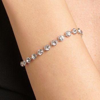 Elegancka bransoletka Brosway SYMPHONIA BYM151 wykonana ze stali chirurgicznej 316L. Zdobiona błyszczącymi kryształami, z regulowanym zapięciem na kulkę. Stylowa biżuteria w pudełku 4.jpg