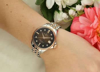 Poznaj Certina Aqua DS Action Lady Powermatic 80 – damski zegarek z brązową tarczą z masy perłowej, 8 diamentami, mechanizmem automatycznym ETA Powermatic 80, wodoszczelnością 20 ATM2.jpg