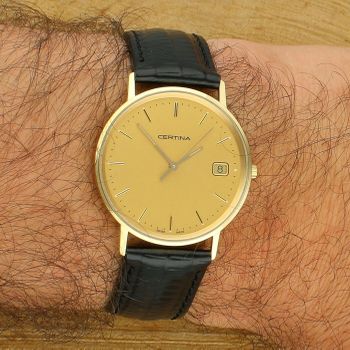 Certina Gold C158.928.96.831 – złoty zegarek unisex 585 z datownikiem i szkłem szafirowym Au.jpg