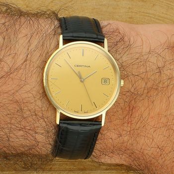 Certina Gold C158.928.96.831 – złoty zegarek unisex 585 z datownikiem i szkłem szafirowym gold.jpg