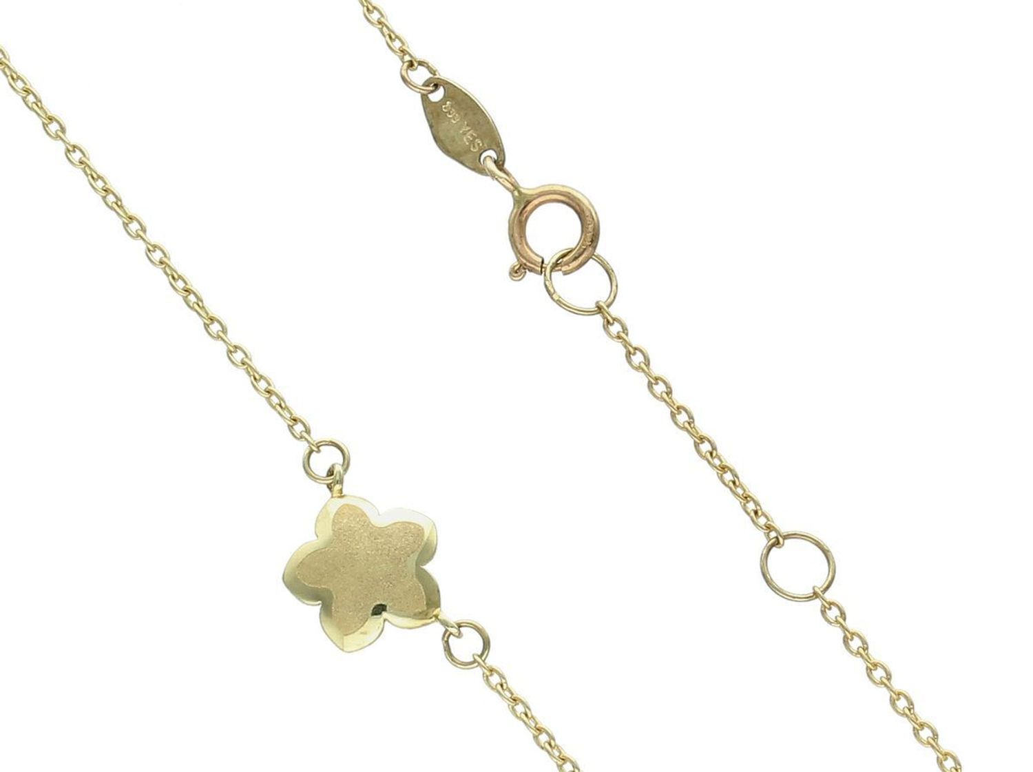 Naszyjnik złoty dla dziecka kwiatek matowy gwiazdka 333 CA10984. Naszyjnik damski wykonany z żółtego złota o subtelnym wzorze. Damska złota biżuteria o formie delikatnej celebrytki łączącej 1.jpg