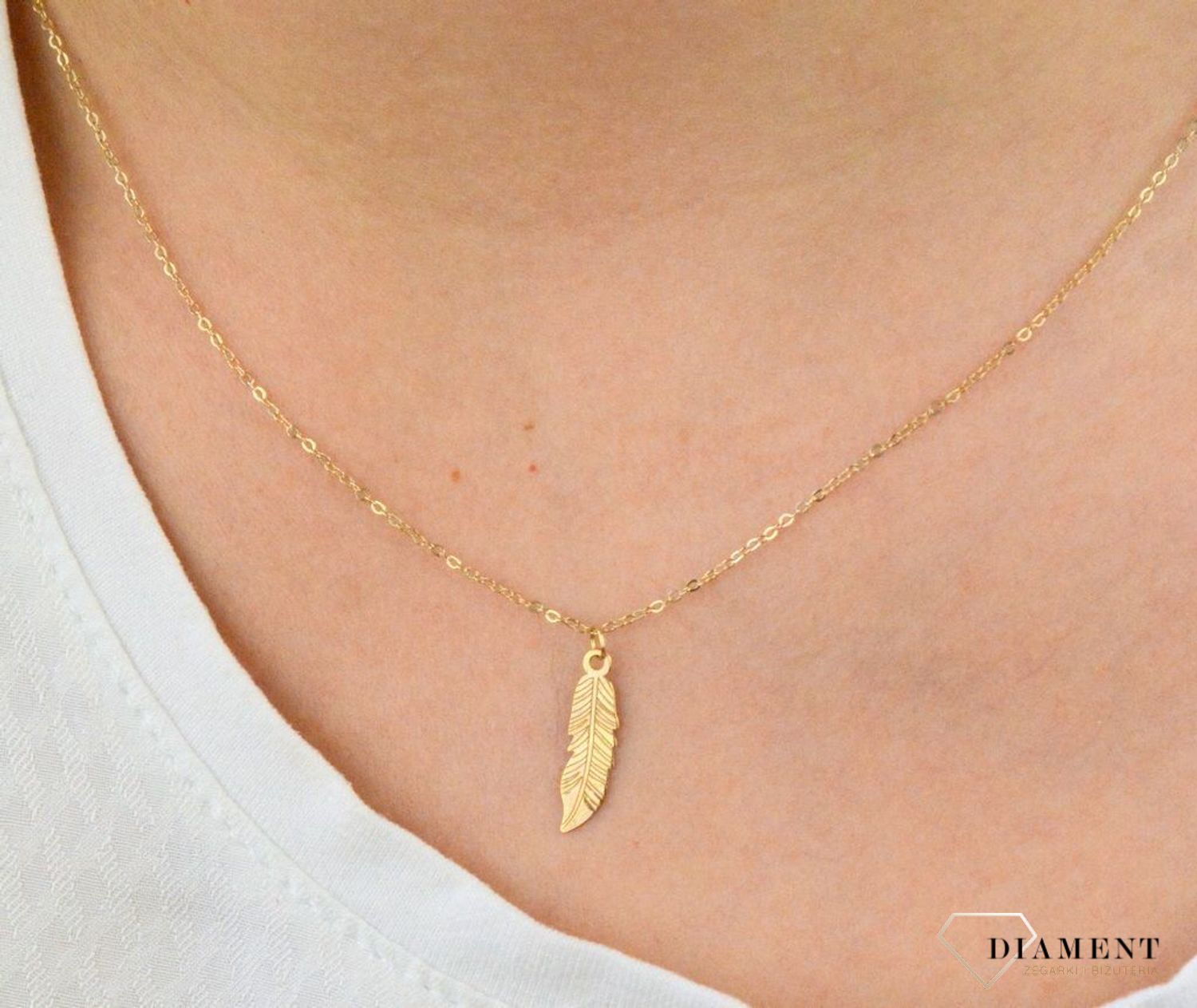 Naszyjnik celebrytka złota z piórkiem CEL172NG.jpg