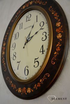 Zegar na ścianę Rhythm drewniany owalny z wzorem CMG298NR06. Owalny duży zegar ścienny w kolorze brązowym. Obudowa wykonana z wytrzymałego drewna w kolorze brązowym (10).JPG