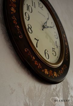 Zegar na ścianę Rhythm drewniany owalny z wzorem CMG298NR06. Owalny duży zegar ścienny w kolorze brązowym. Obudowa wykonana z wytrzymałego drewna w kolorze brązowym (9).JPG