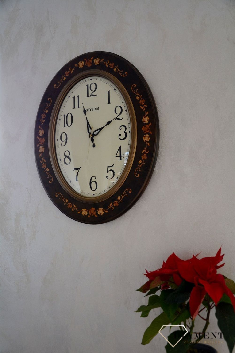 Zegar na ścianę Rhythm drewniany owalny z wzorem CMG298NR06 (2).jpg