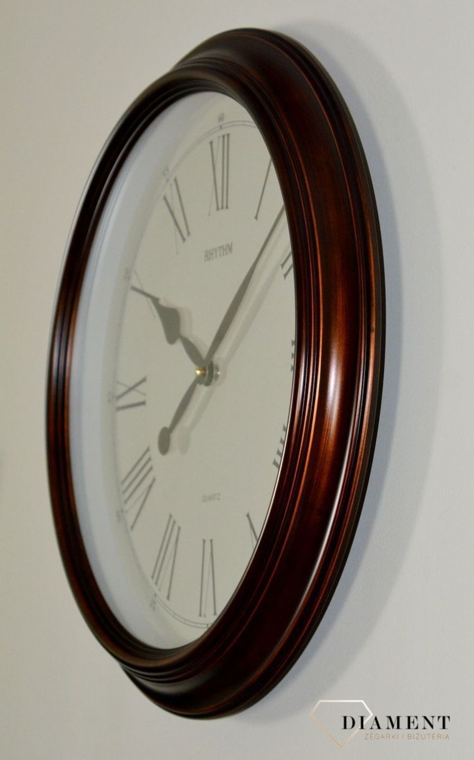 Zegar na ścianę drewniany okrągły 47 cm CMG736NR35. Zegar ścienny drewniany japoński RHYTHM CMG736NR35 wyposażony jest w kwarcowy mechanizm, zasilany za pomocą baterii (1).JPG