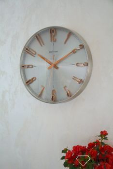 Zegar ścienny do salonu srebrny Rhythm z różowym złotem CMG554NR19. Zegar ścienny do salonu zachowany w nowoczesnej formie. Okrągła obudowa wykonana z wysokiej jakości materiału metalu (7).JPG