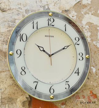 Zegar na ścianę do salonu Rhythm 'Złote lustro' to nowoczesny zegar na ścianę, który jest bardzo czytelny. Idealny na prezent na rocznicę Ślubu. Zegarki-diament (2).JPG
