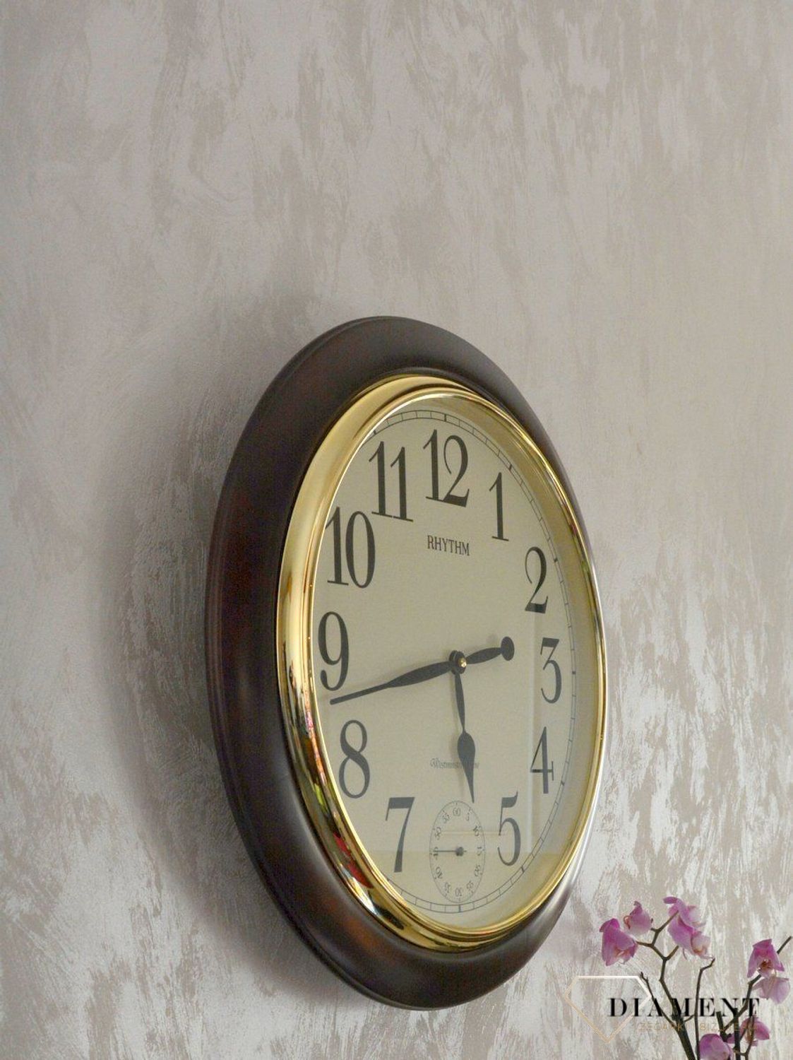 Zegar ścienny drewniany Rhythm melodie, kurant CMH755NR06 🕰 Zegar ścienny do salonu w okrągłej drewnianej obudowie w kolorze orzecha.  (9).JPG