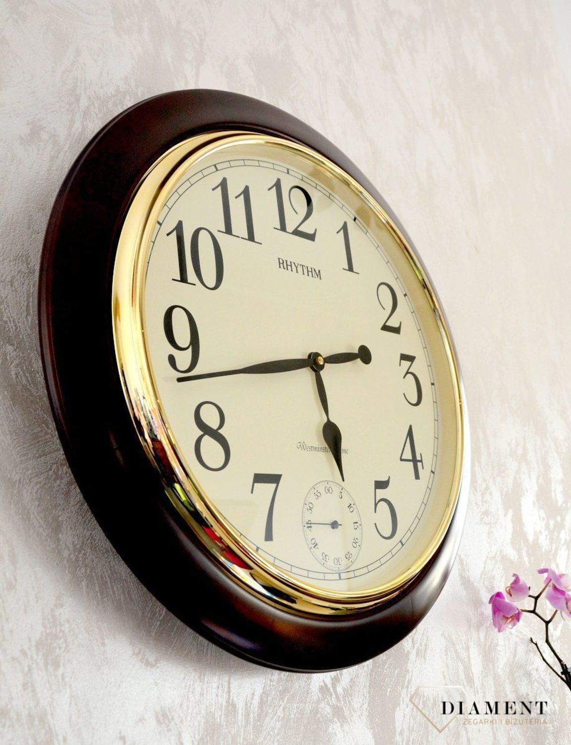 Zegar ścienny drewniany Rhythm melodie, kurant CMH755NR06 🕰 Zegar ścienny do salonu w okrągłej drewnianej obudowie w kolorze orzecha.  (9).JPG