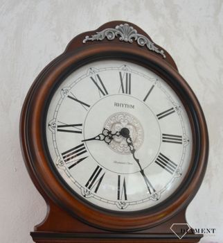 Zegar ścienny drewniany Rhythm zdobiony z wahadłem CMJ380CR06 🕰 Zegar ścienny wykonany z wysokiej jakości drewna w kolorze orzecha (10).JPG