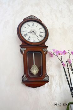 Zegar ścienny drewniany Rhythm zdobiony z wahadłem CMJ380CR06 🕰 Zegar ścienny wykonany z wysokiej jakości drewna w kolorze orzecha (2).JPG