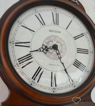Zegar ścienny drewniany Rhythm zdobiony z wahadłem CMJ380CR06 🕰 Zegar ścienny wykonany z wysokiej jakości drewna w kolorze orzecha (9).JPG
