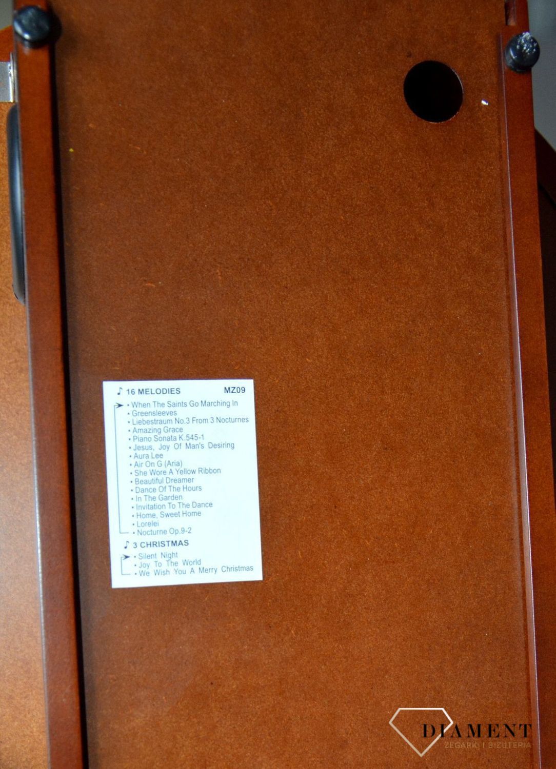 Zegar ścienny Rhythm drewniany z wahadłem CMJ575NR06ybnfgy.jpg